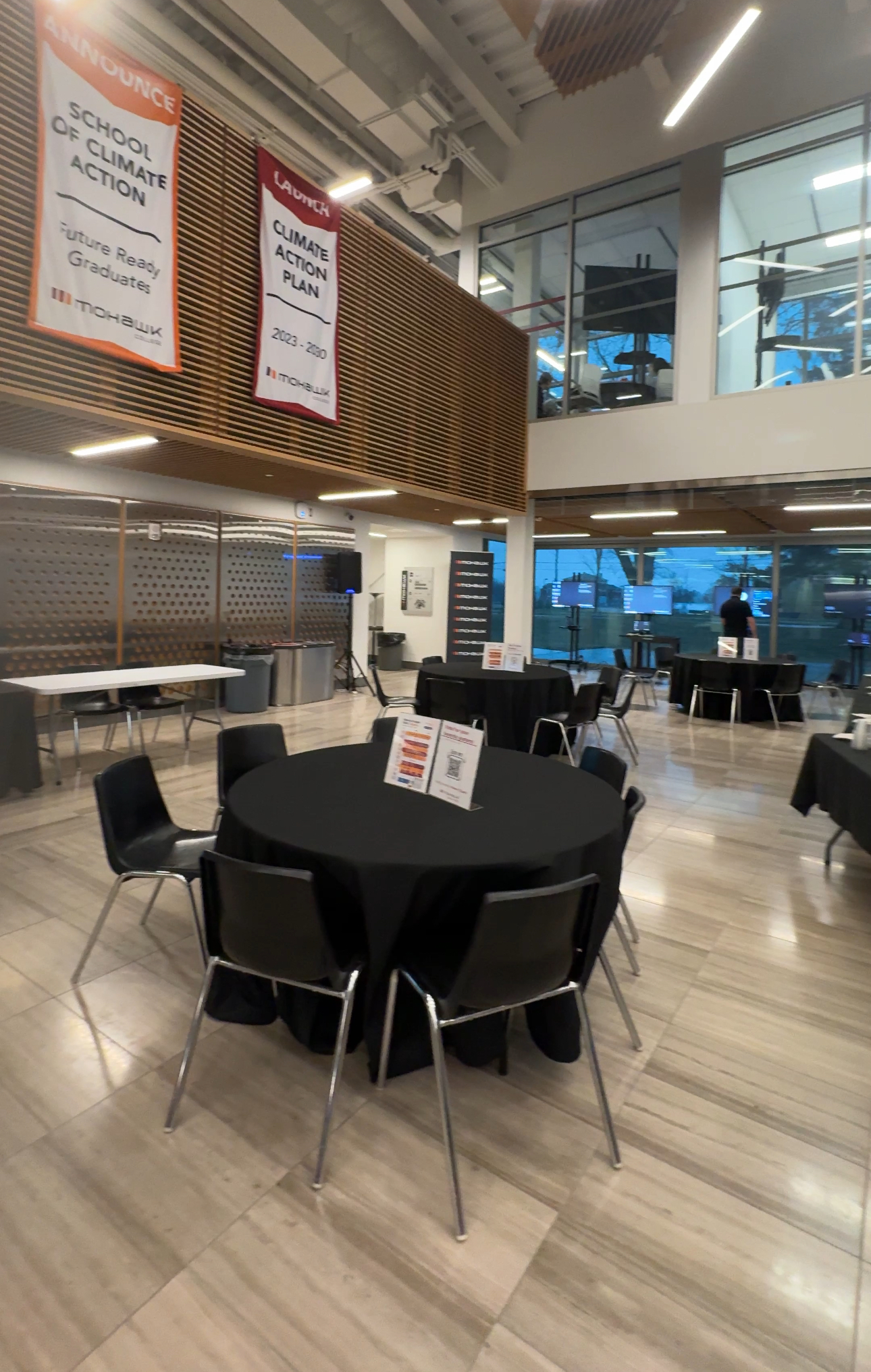 Event venue with round tables and staging