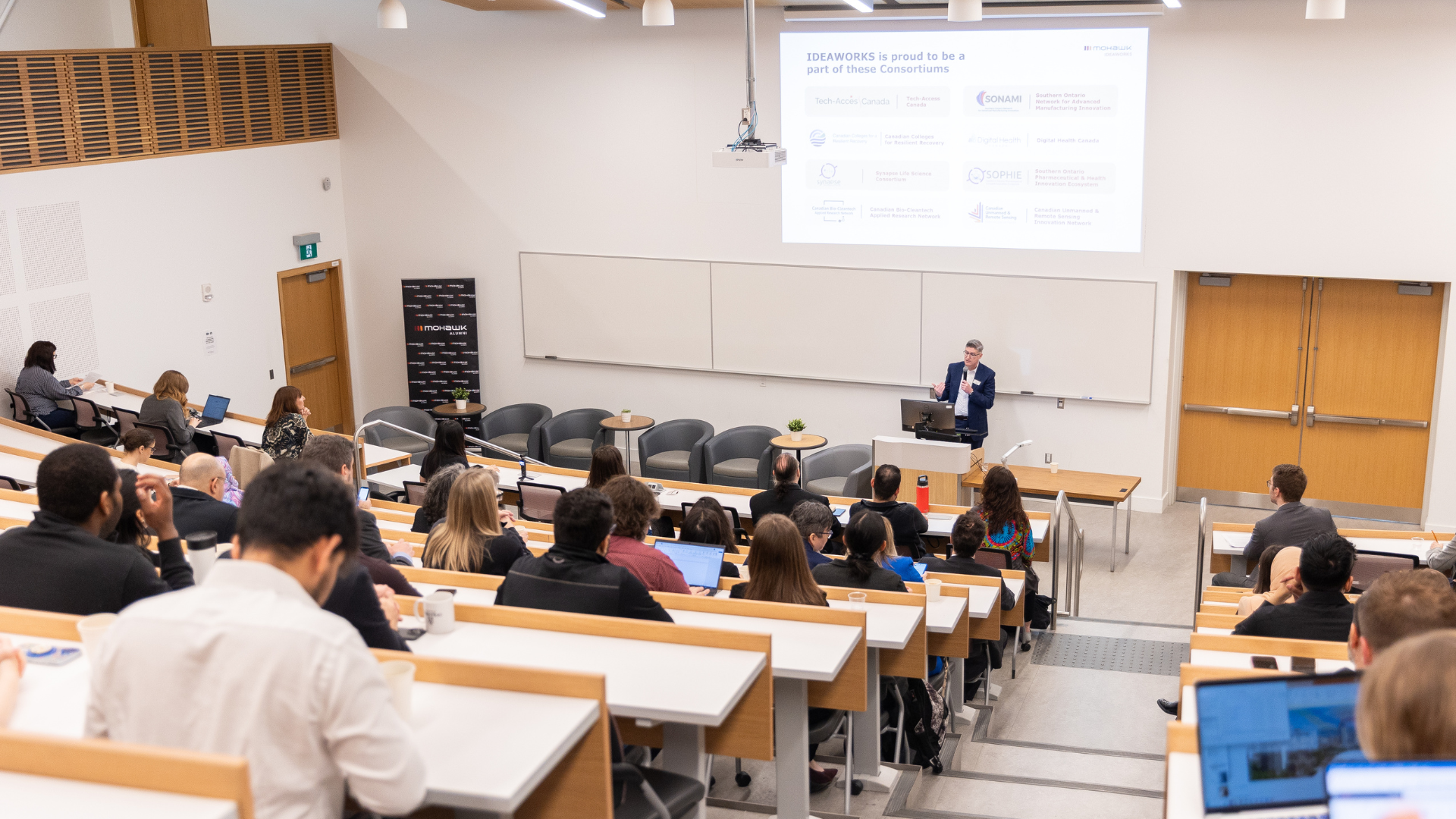 Modern auditorium with presentation on screen
