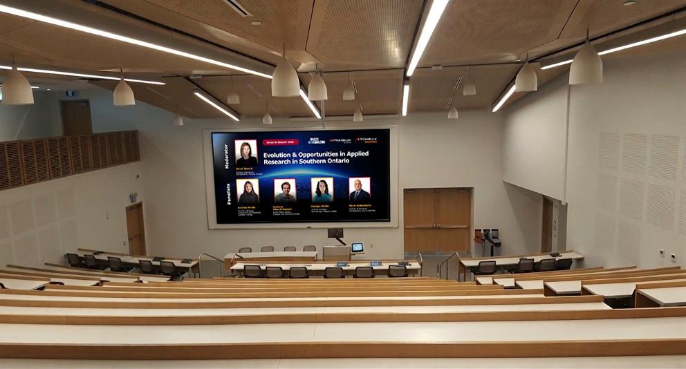Audience seated in a lecture theater during Ideas to Impact