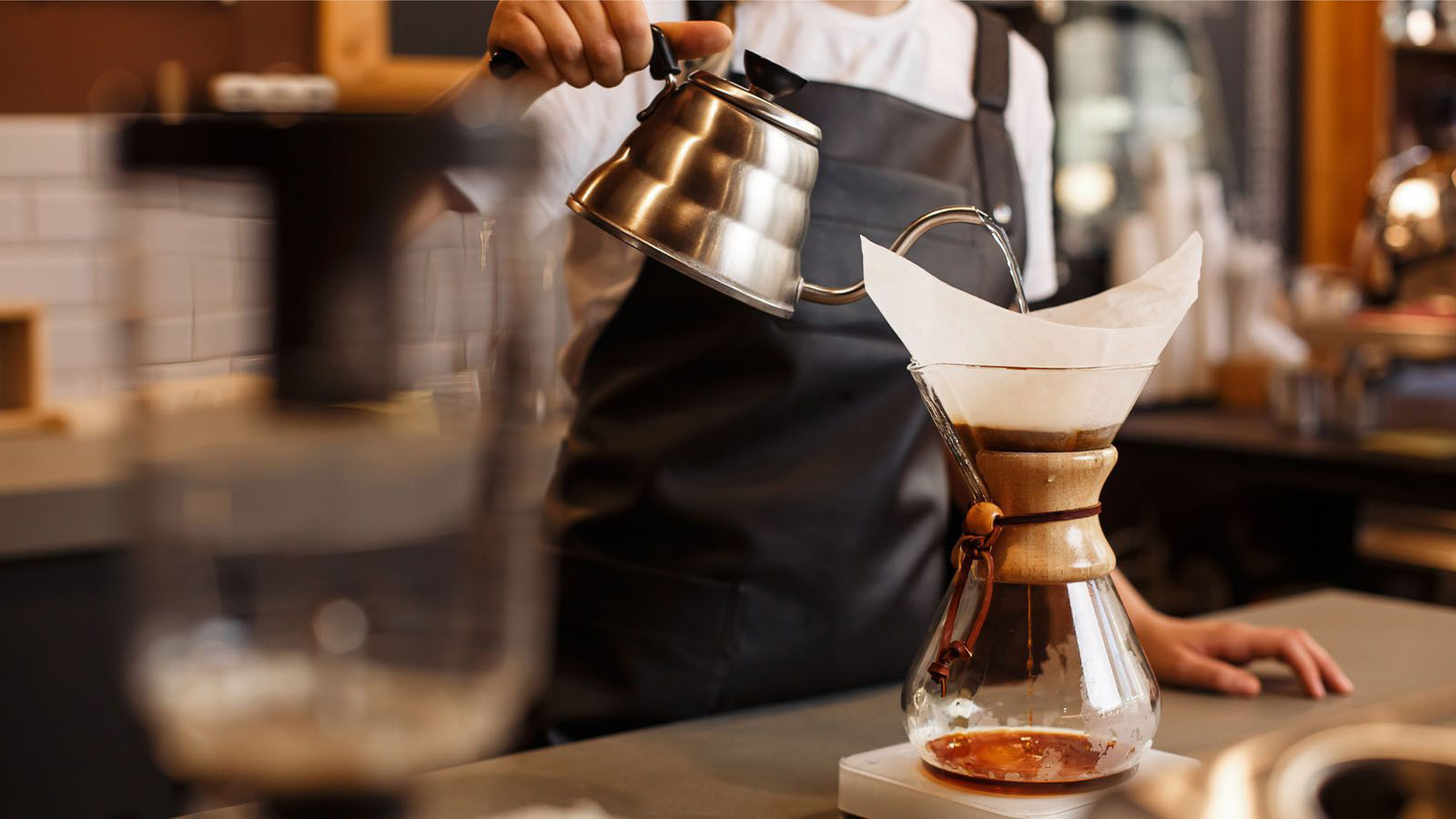 Pour-over coffee scene — kettle and Chemex